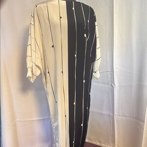 Vintage Elegant Black and Cream Striped Dress with bat wing arms and side slits